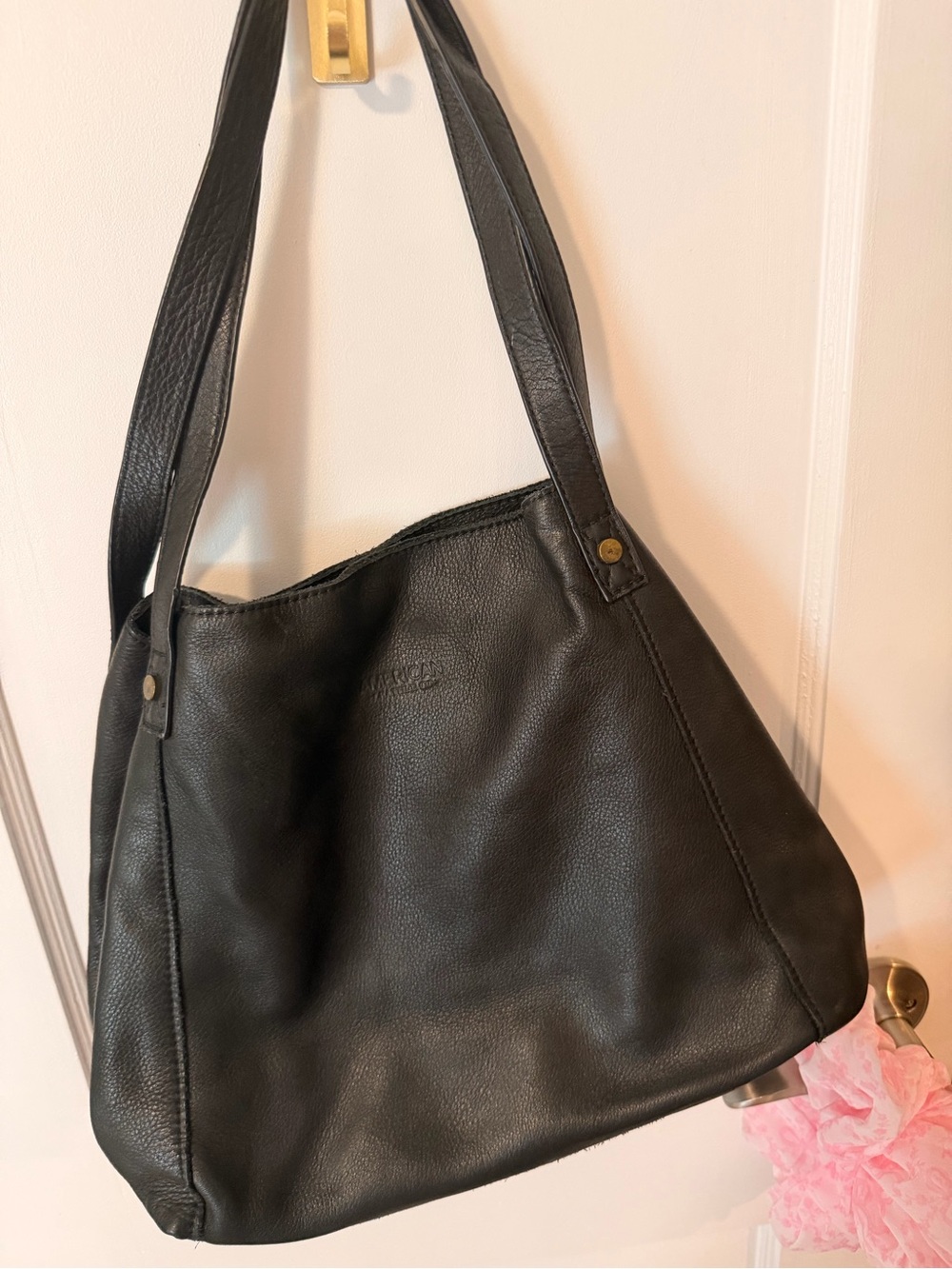 Classic Black Leather Shoulder Bag with Subtle Embossed Logo